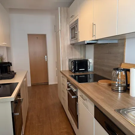 Lägenhetshotell Moderne Einzelzimmer Mit Eigenem Bad & Gemeinschaftskueche 3*